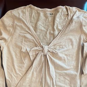 Three quarter sleeve tee with a ruched neckline